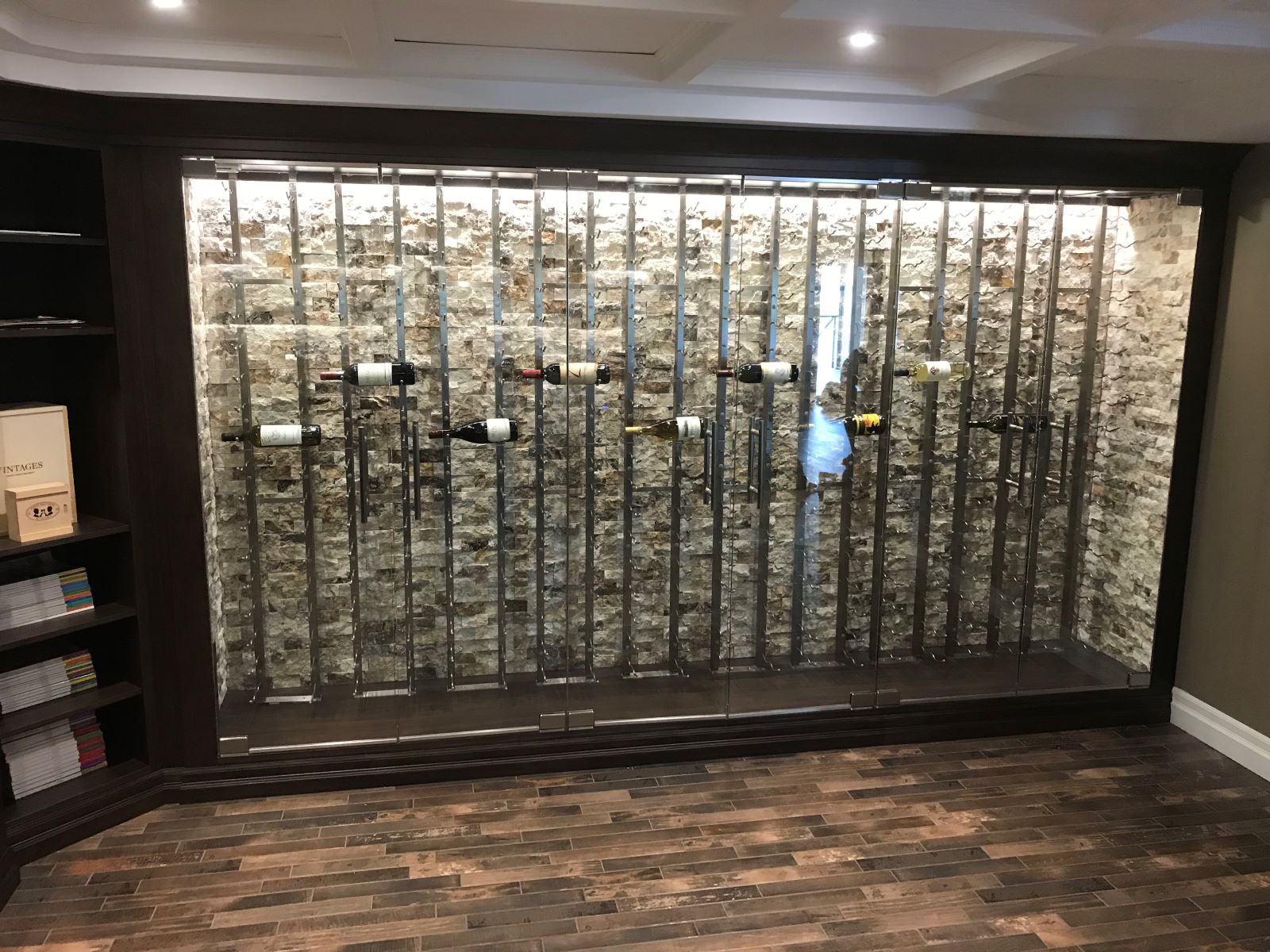 6 door glass wine cellar with brushed nickle hardware and ladder pull handles 