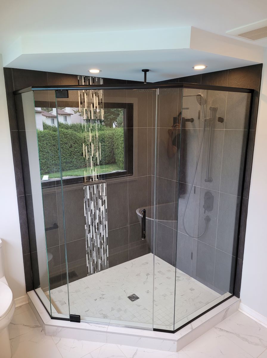 custom glass neo angle shower with round matte black hardware