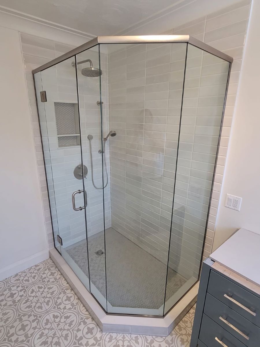 custom glass neo angle shower with brushed nickle glass mounted hinges 