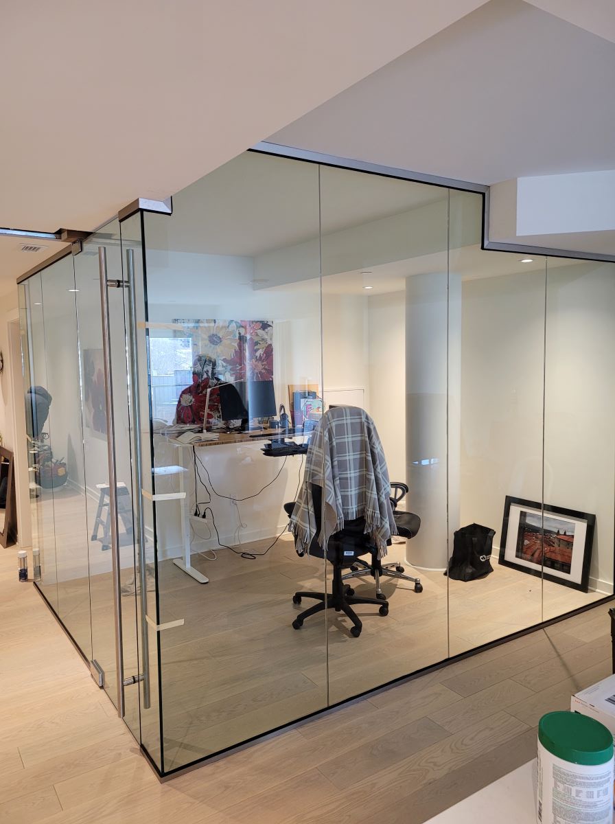 12mm glass office with a 60" ladder pull handle and brushed nickle hardware 