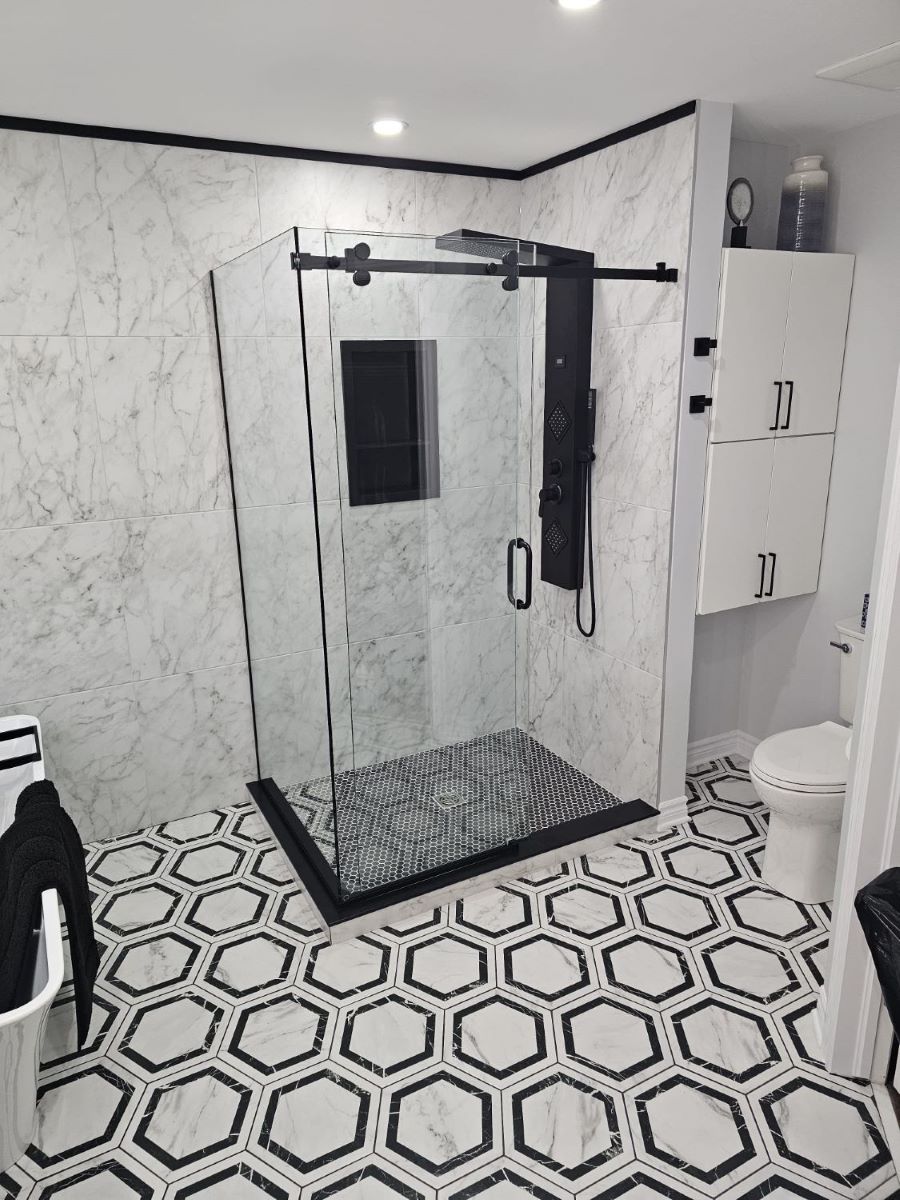 custom glass sliding door shower with matte black hardware 